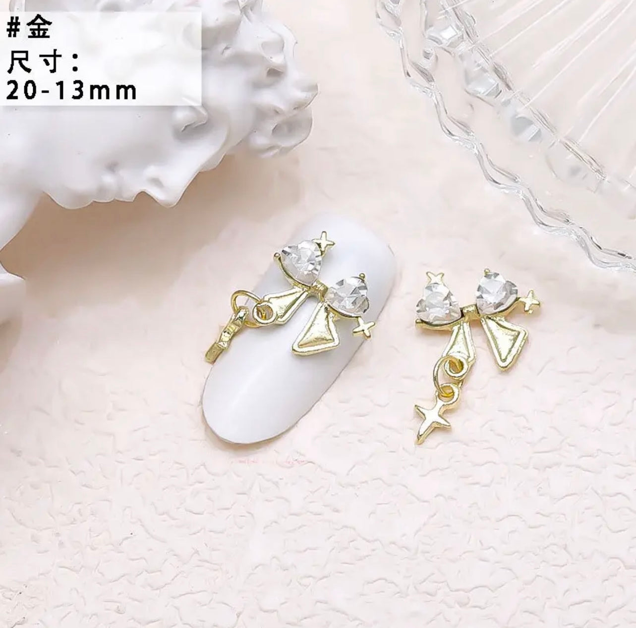 Rhinestone Bow with Star Dangle - Gold/Crystal