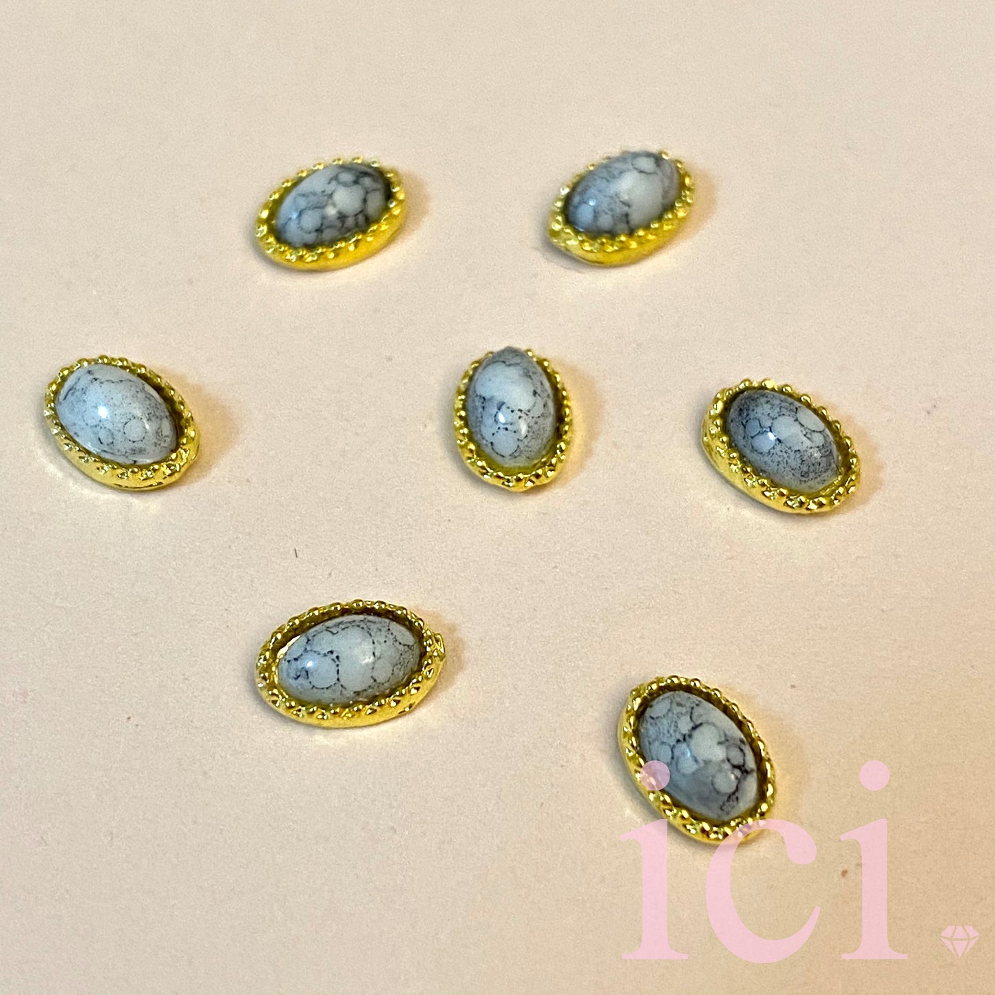 White Marble Oval with Gold trim