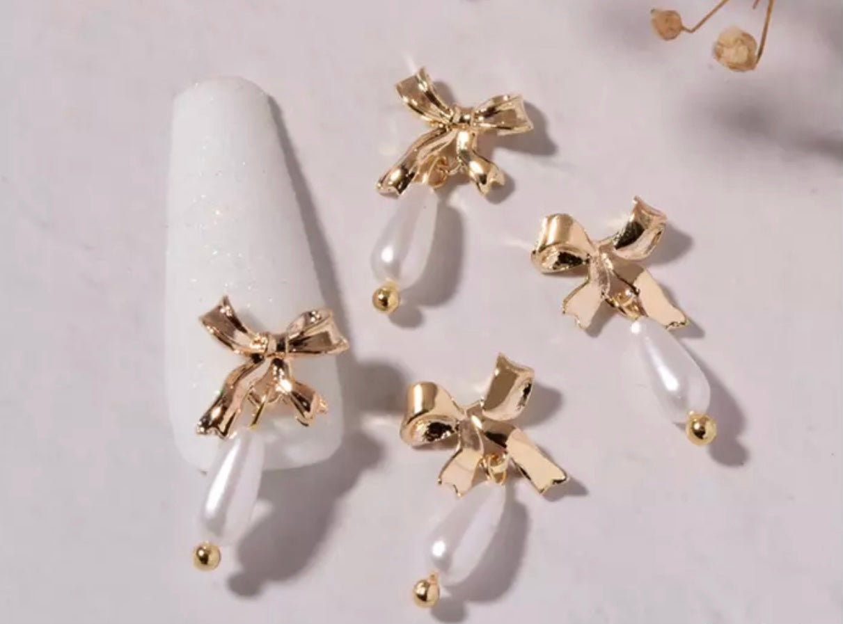 Bow with Long Pearl Dangle