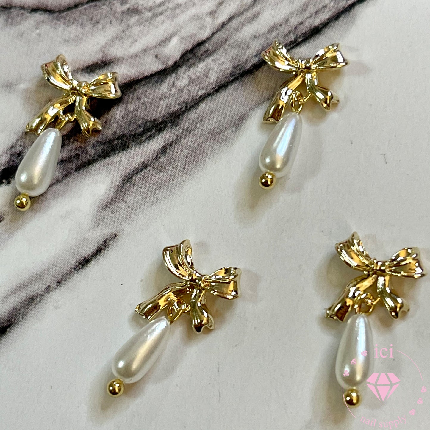 Bow with Long Pearl Dangle