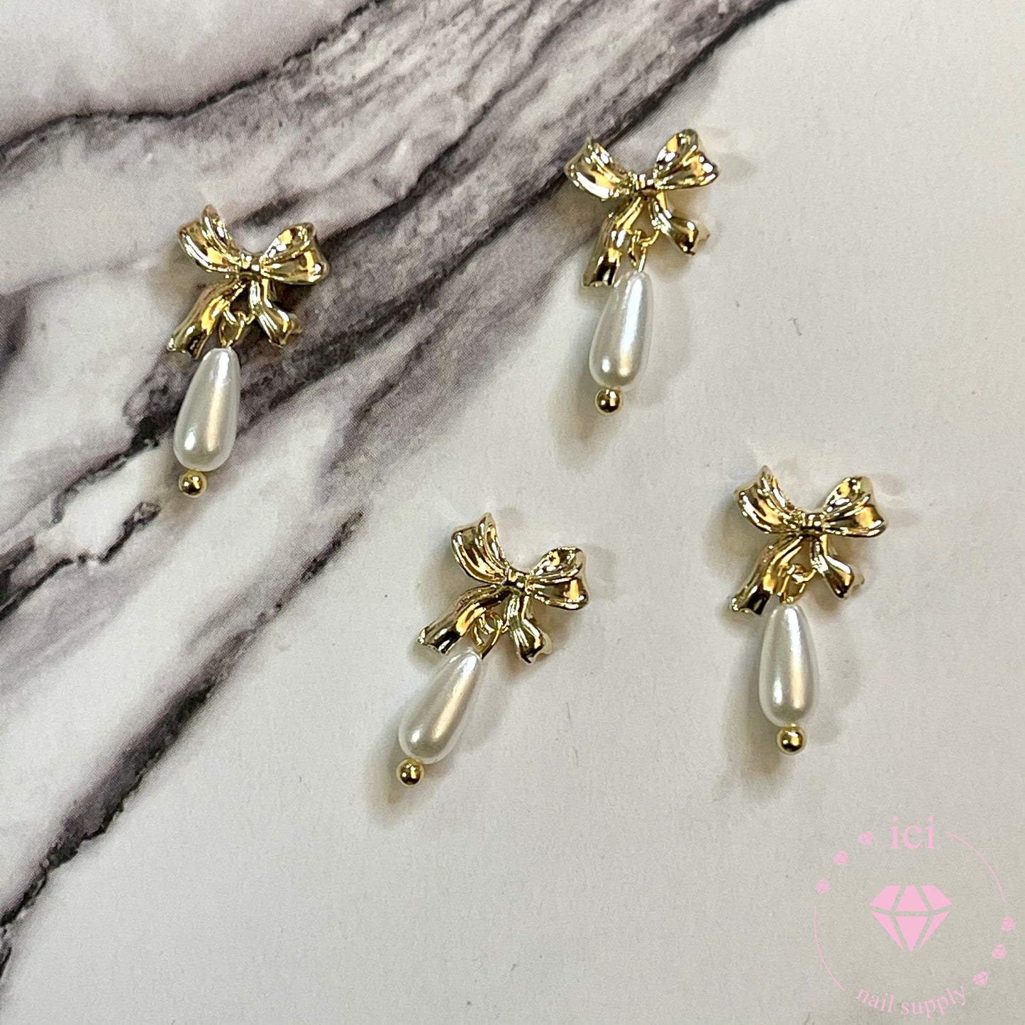 Bow with Long Pearl Dangle