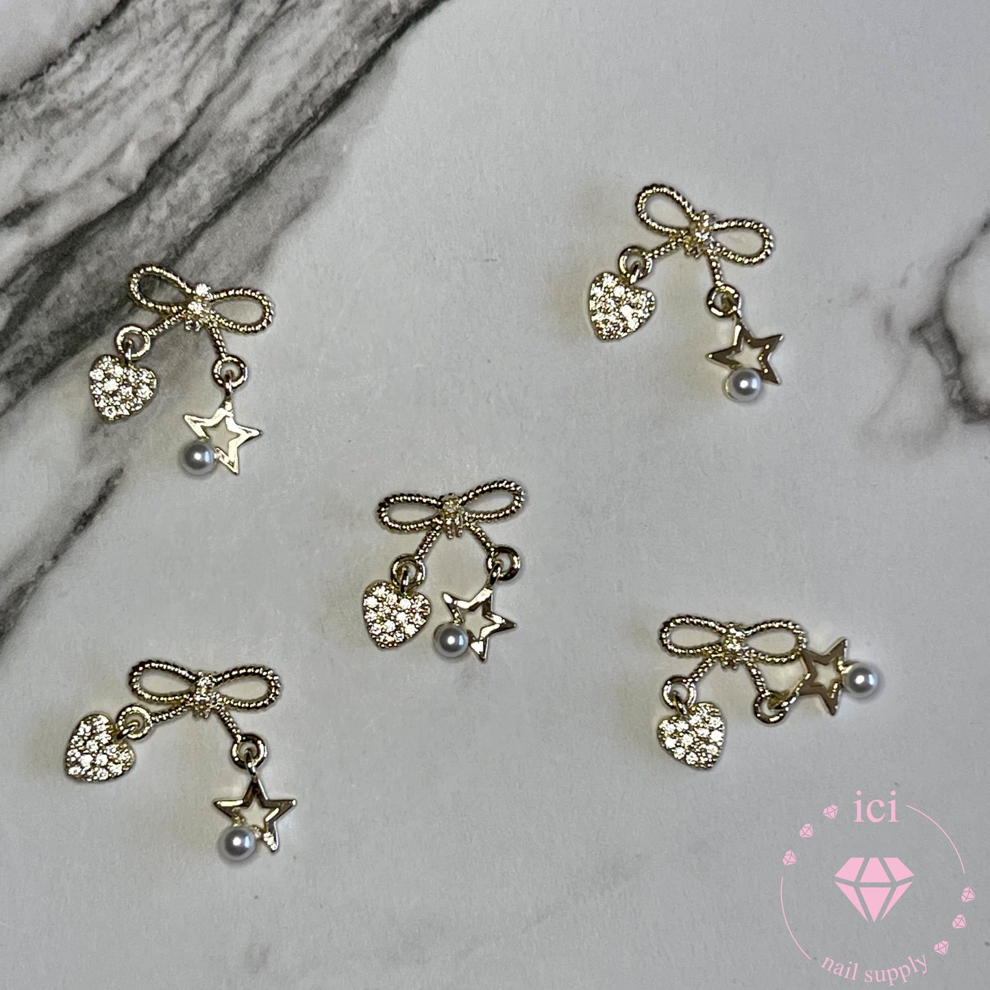 Bow with Heart and Star Pearl Dangle