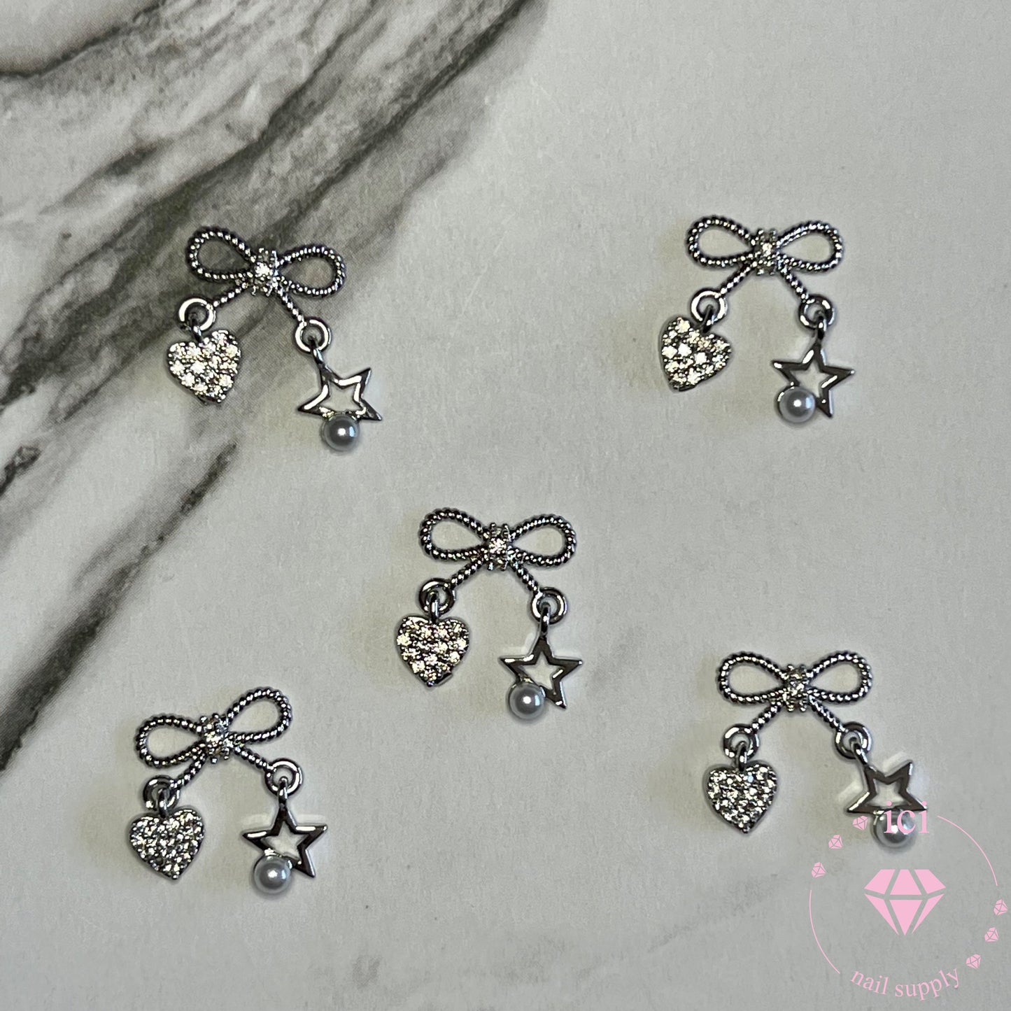 Bow with Heart and Star Pearl Dangle