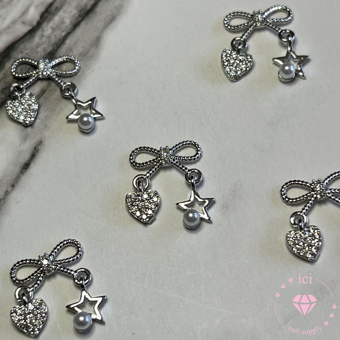 Bow with Heart and Star Pearl Dangle
