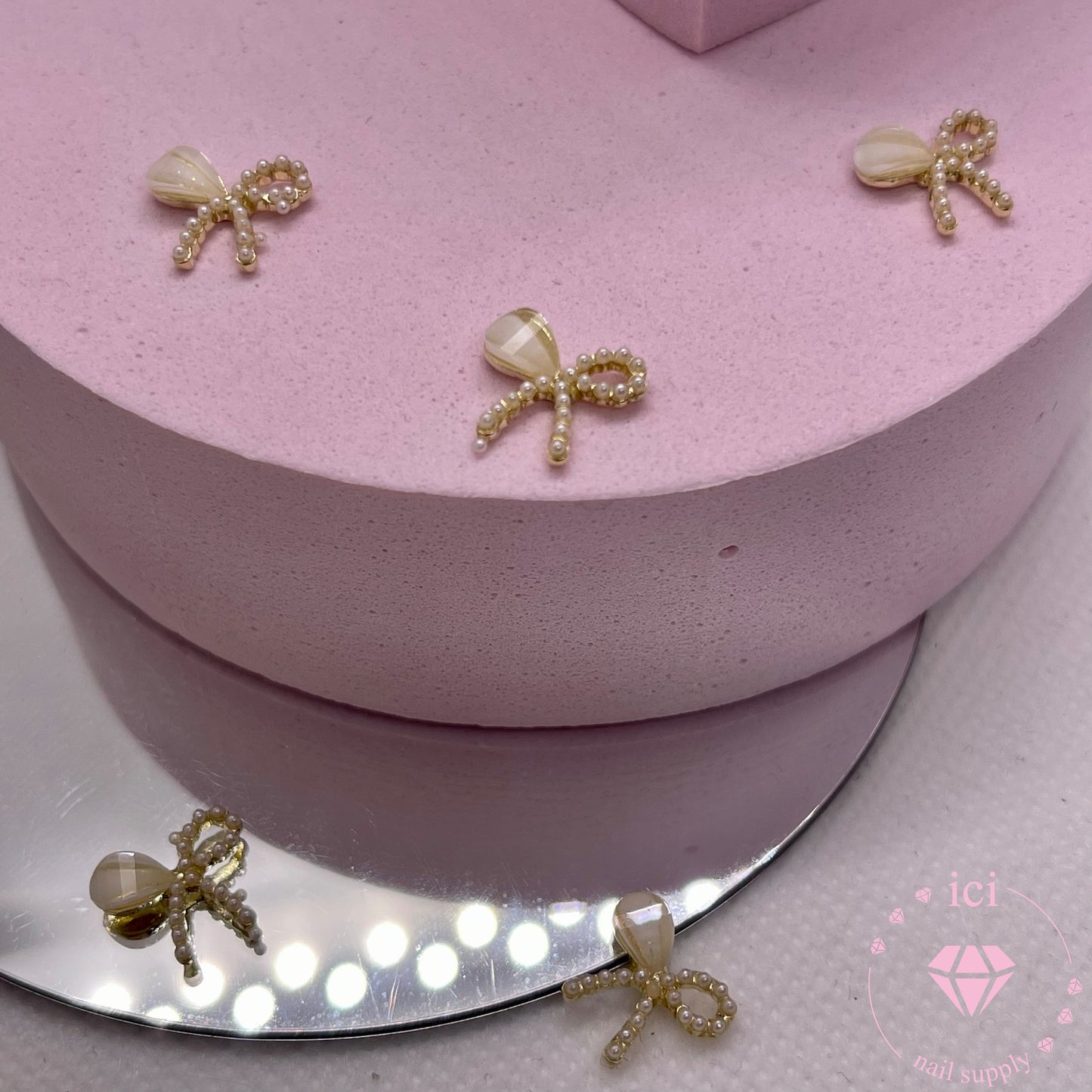 Pearl Bow with Half Stone