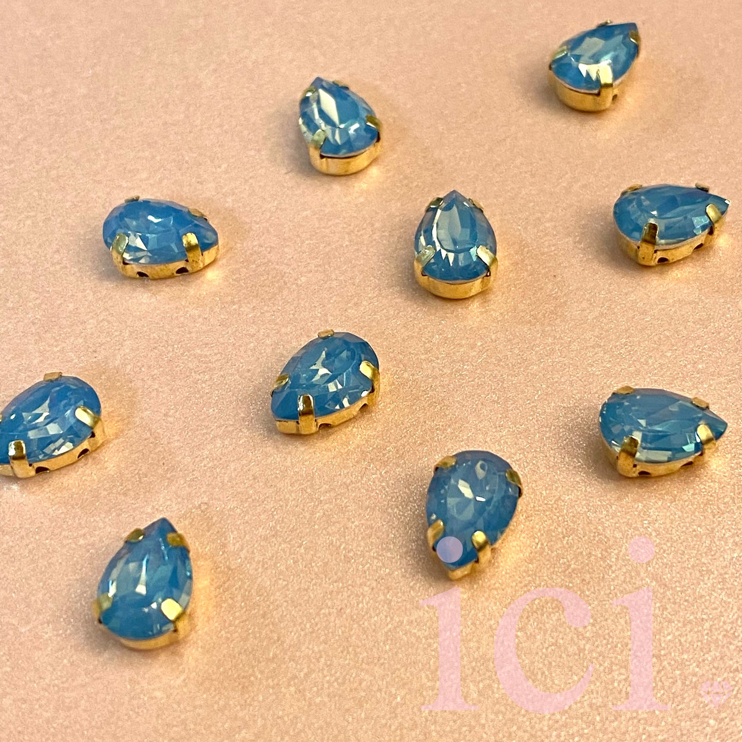 Blue Teardrop Stone with Gold Trim