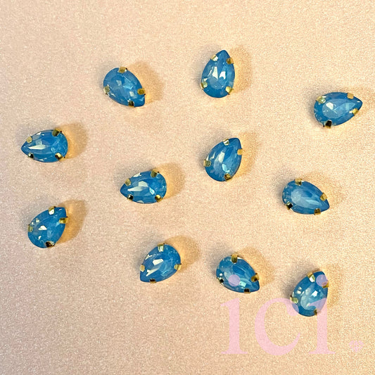 Blue Teardrop Stone with Gold Trim